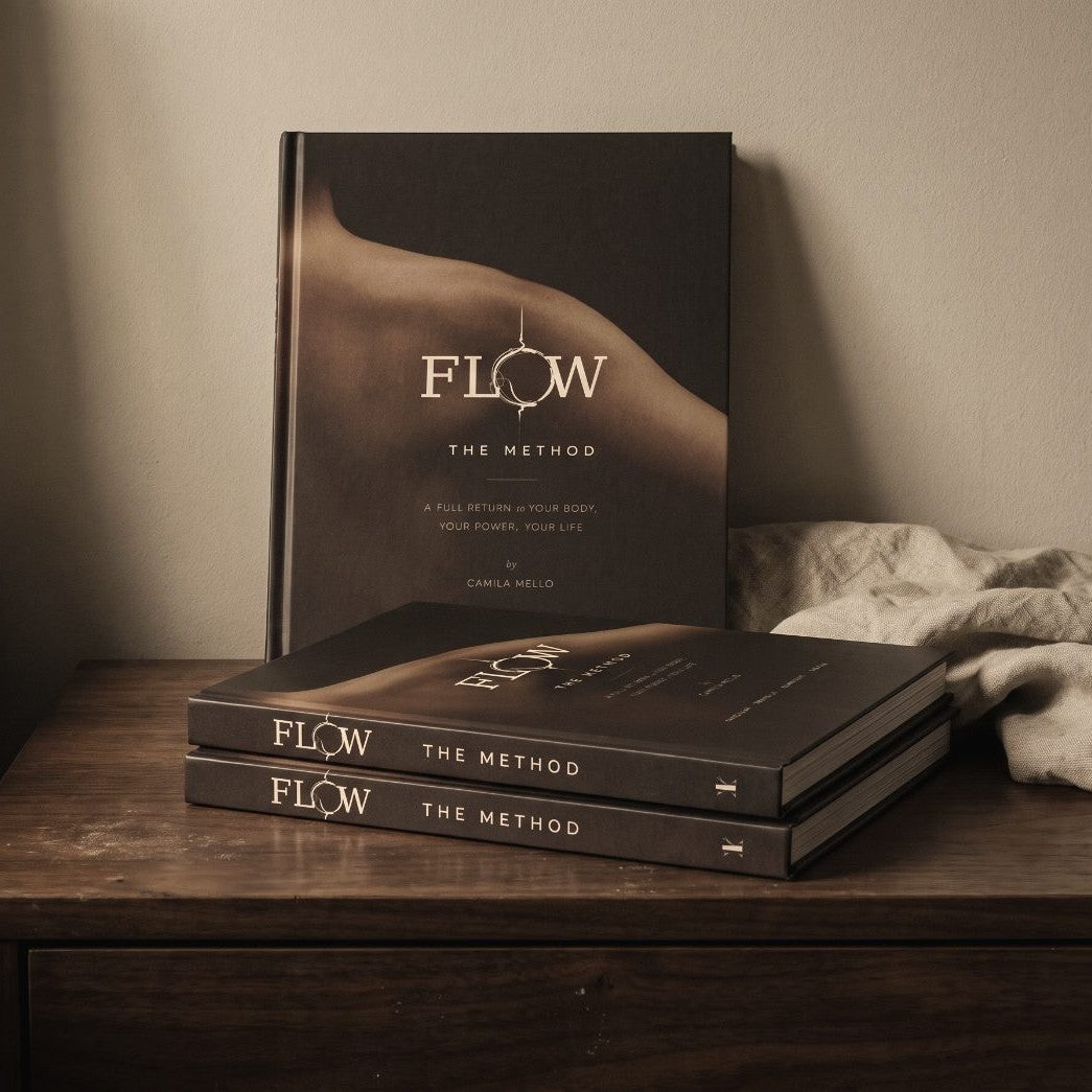 Flow.TheMethod hardcover books on a nightstand